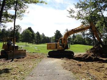 Expanding the green space at the Waterville Country Club, by Rossignol's Excavating.