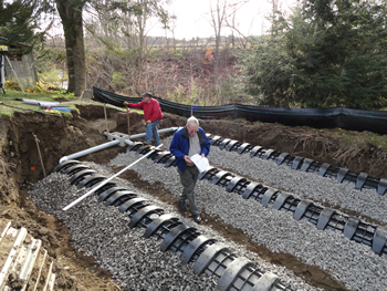 Inspection of an Infiltrator Septic System built by Rossignol's Excavating.
