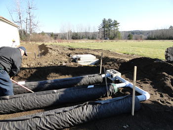 Rossignol Excavating installing a Presby Environmental Septic System.