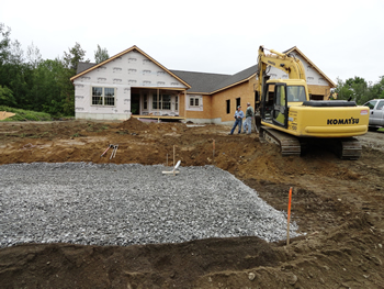 Crushed rock drain field for a Residential Septic System by Rossignol's Excavating.