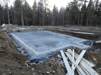 Footings and drainage, ready for foundation walls by Rossignol's Excavating.