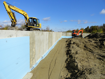 Compacting and backfilling on a commercial foundation by Rossignol's Excavating